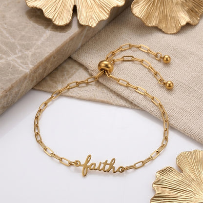 Armband aus 18-karätig vergoldet mit Anhänger in Schriftform und 